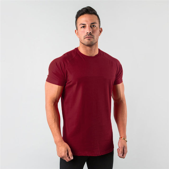 Elevate your workout game with our Performance Essential Male Gym T-Shirt. Crafted for maximum comfort and style, this shirt is designed to keep you cool and focused during even the most intense training sessions. Made with high-quality materials, it offers exceptional breathability and flexibility, allowing you to move with ease. Whether you're hitting the weights or breaking a sweat in cardio, this shirt has got you covered. Upgrade your gym wardrobe and experience the difference today