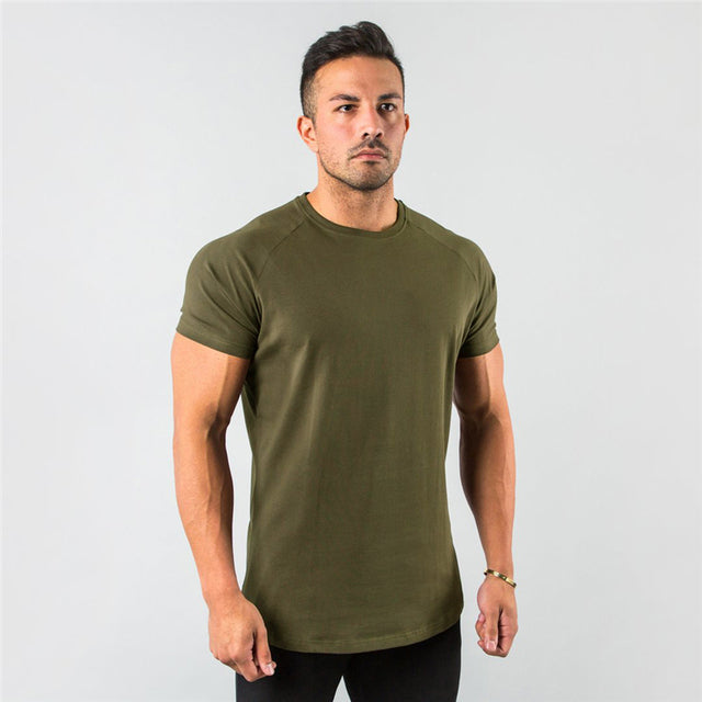 Elevate your workout game with our Performance Essential Male Gym T-Shirt. Crafted for maximum comfort and style, this shirt is designed to keep you cool and focused during even the most intense training sessions. Made with high-quality materials, it offers exceptional breathability and flexibility, allowing you to move with ease. Whether you're hitting the weights or breaking a sweat in cardio, this shirt has got you covered. Upgrade your gym wardrobe and experience the difference today