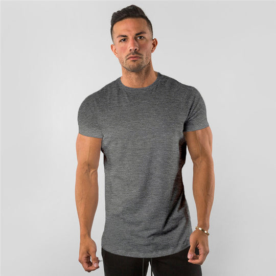 Elevate your workout game with our Performance Essential Male Gym T-Shirt. Crafted for maximum comfort and style, this shirt is designed to keep you cool and focused during even the most intense training sessions. Made with high-quality materials, it offers exceptional breathability and flexibility, allowing you to move with ease. Whether you're hitting the weights or breaking a sweat in cardio, this shirt has got you covered. Upgrade your gym wardrobe and experience the difference today