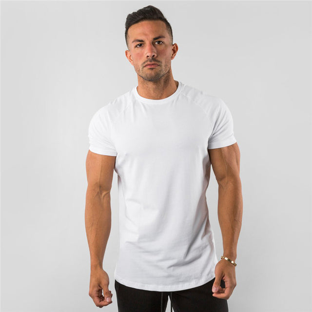 Elevate your workout game with our Performance Essential Male Gym T-Shirt. Crafted for maximum comfort and style, this shirt is designed to keep you cool and focused during even the most intense training sessions. Made with high-quality materials, it offers exceptional breathability and flexibility, allowing you to move with ease. Whether you're hitting the weights or breaking a sweat in cardio, this shirt has got you covered. Upgrade your gym wardrobe and experience the difference today